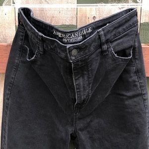 Distressed black jeggings, cut out knees, super stretch style